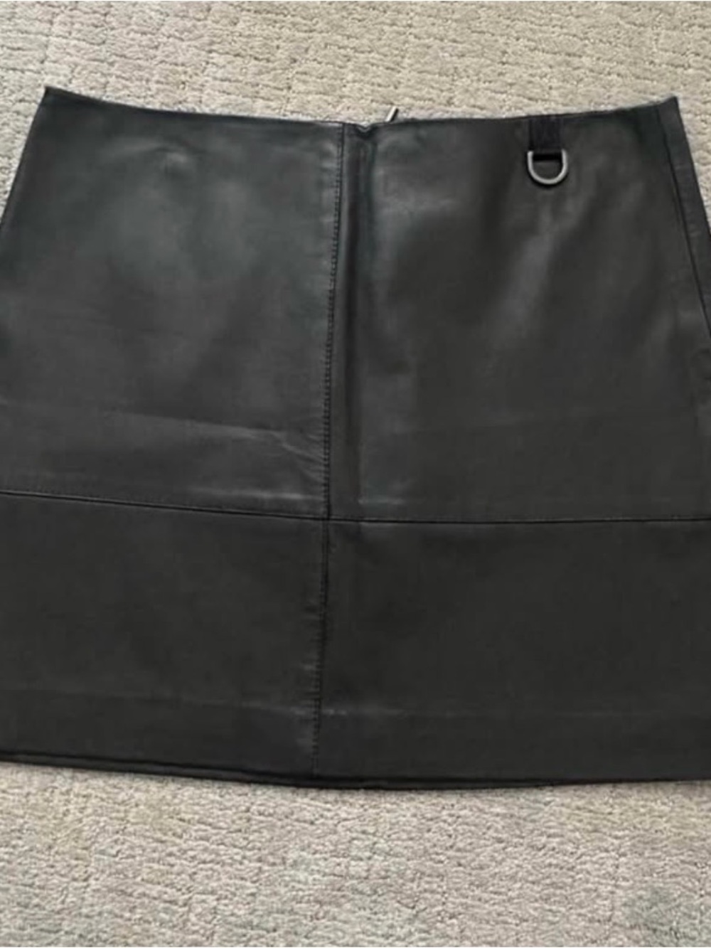 Classic Black Faux Leather Mini Skirt
NWT Kenneth Cole Black Leather Mini Skirt